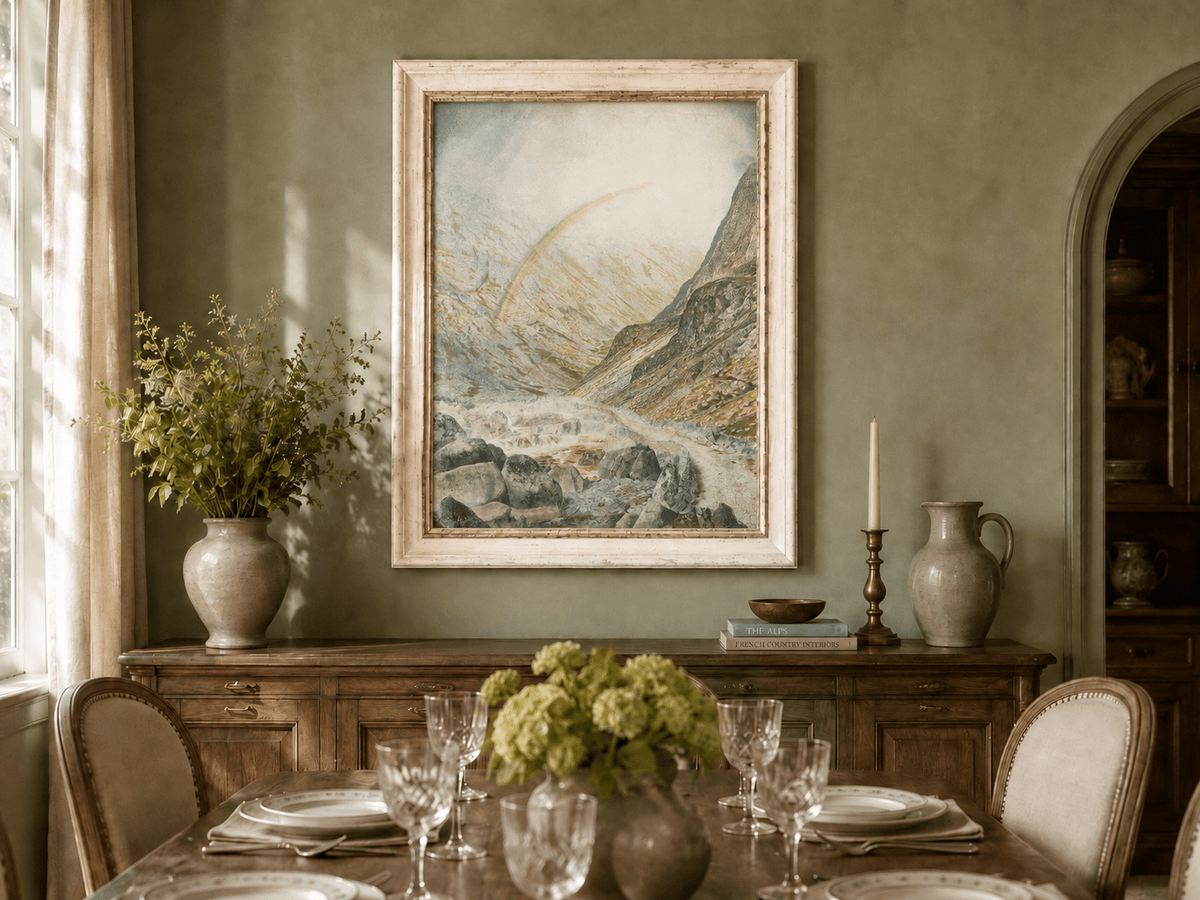 Rainbow over mountain pass and river oil landscape artwork shown in a styled home interior.