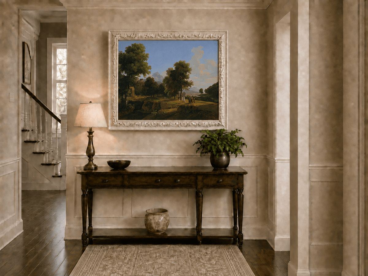 Hand-painted riverside grove with classical figures landscape oil painting displayed above a console table in a hallway interior.