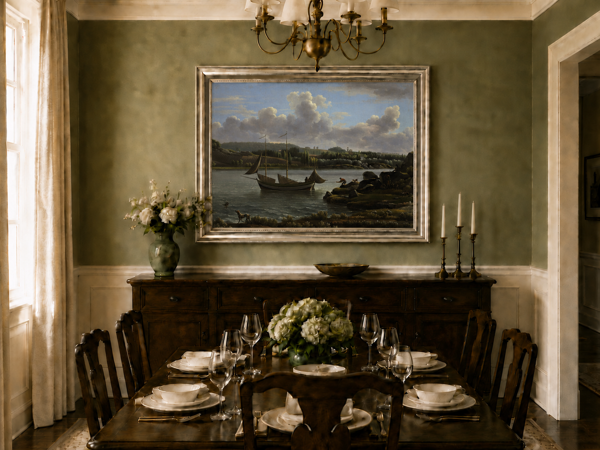 Hand-painted riverside sailboat with figures, dogs and distant hills landscape oil painting displayed in a dining room interior.