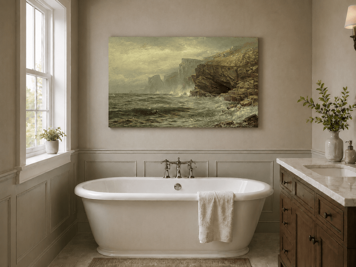 Unframed hand-painted rocky seaside oil painting with churning waves and misty cliffs displayed above a freestanding bathtub.