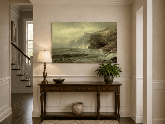 Unframed hand-painted rocky seaside oil painting with churning waves and misty cliffs displayed above an entryway console table.