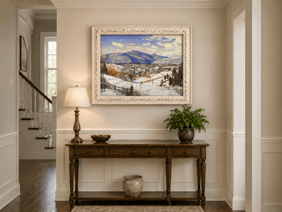 Hand-painted Snowy Mountain Village in Winter Light landscape oil painting displayed as wall art in a styled interior