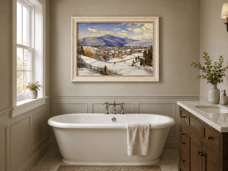 Hand-painted Snowy Mountain Village in Winter Light landscape oil painting displayed as wall art in a styled interior