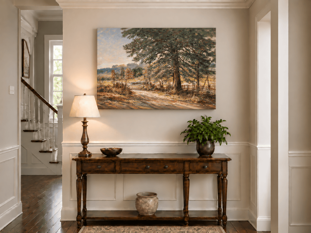 Hand-painted Sunlit Country Road with Evergreen Tree landscape oil painting displayed as wall art in a styled interior