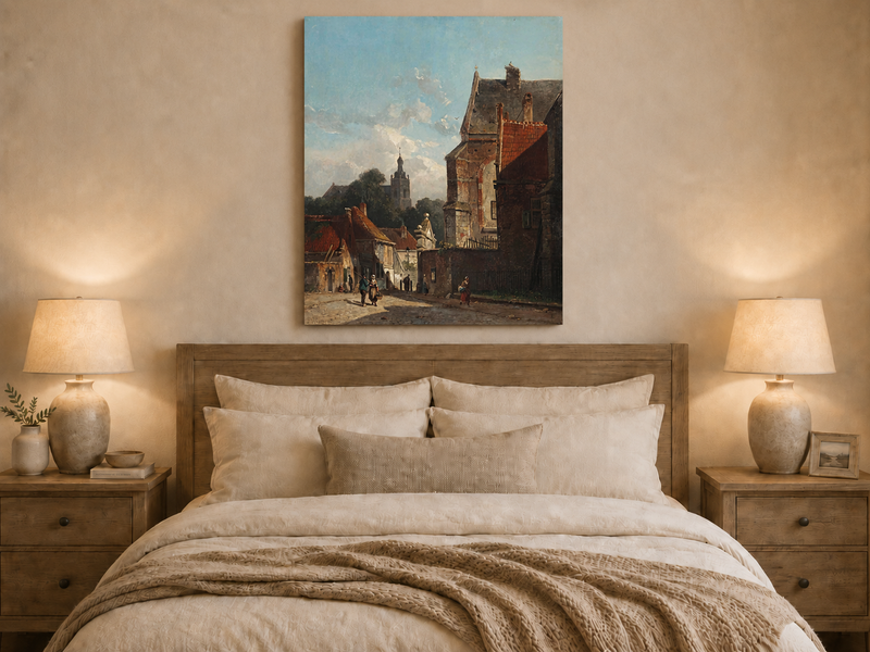 Town street with old buildings and tower oil painting displayed as landscape wall decor in a styled room.