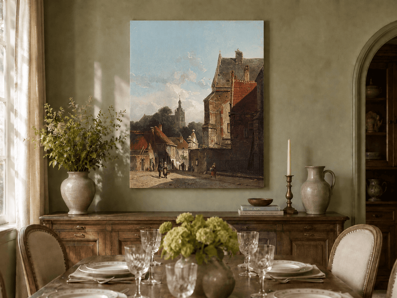 Hand-painted town street with old buildings and tower landscape artwork shown in an interior wall display.