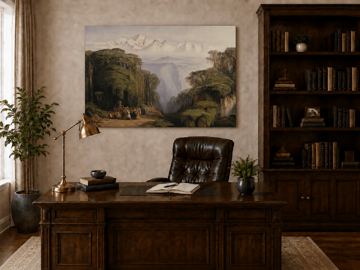 Hand-painted tropical jungle with snow-capped peaks and villagers landscape oil painting displayed above a desk in a home office interior.