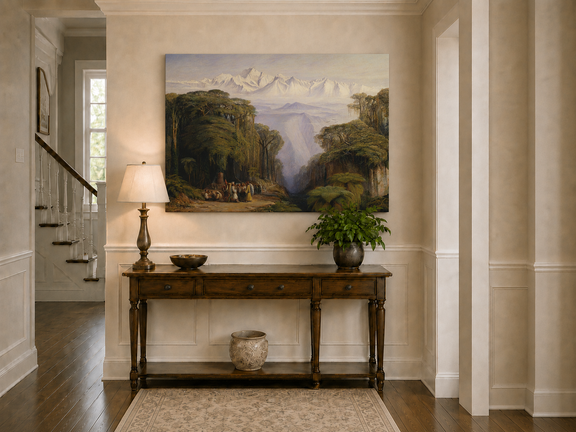 Hand-painted tropical jungle with snow-capped peaks and villagers landscape oil painting displayed above a console table in a hallway interior.