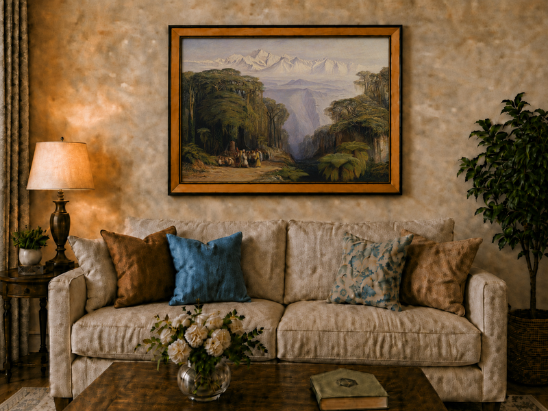 Hand-painted tropical jungle with snow-capped peaks and villagers landscape oil painting displayed above a sofa in a living room interior.