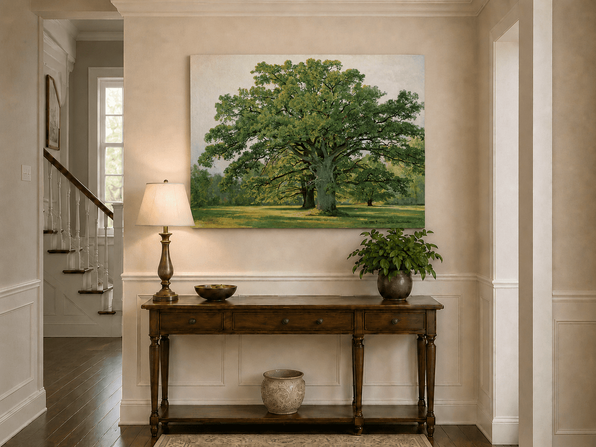 Unframed hand-painted meadow oil painting with a majestic spreading oak tree displayed above an entryway console table.