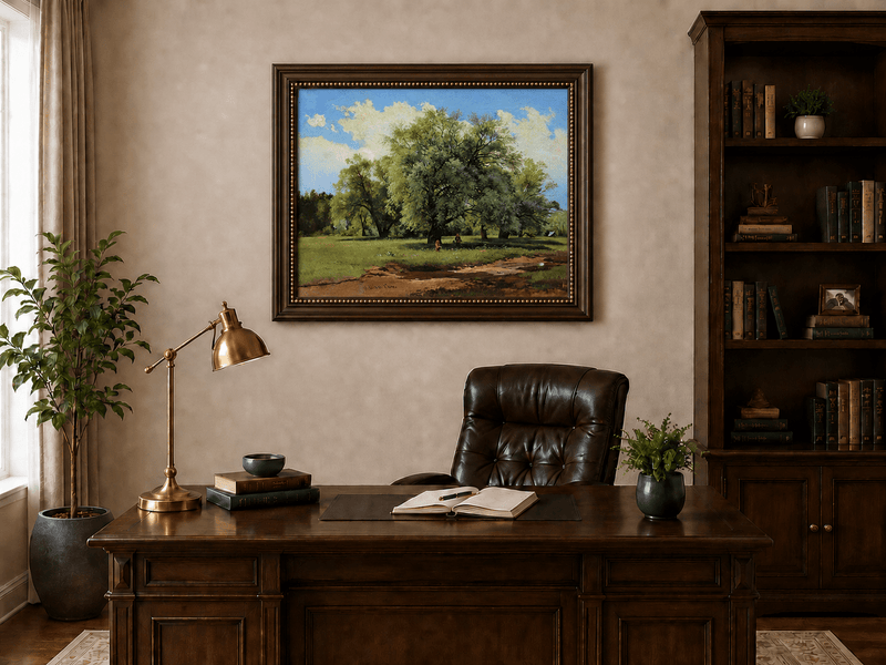 Framed hand-painted meadow oil painting with trees and small figures displayed above a traditional home office desk.