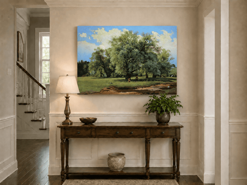 Unframed hand-painted meadow oil painting with trees and small figures displayed above an entryway console table.