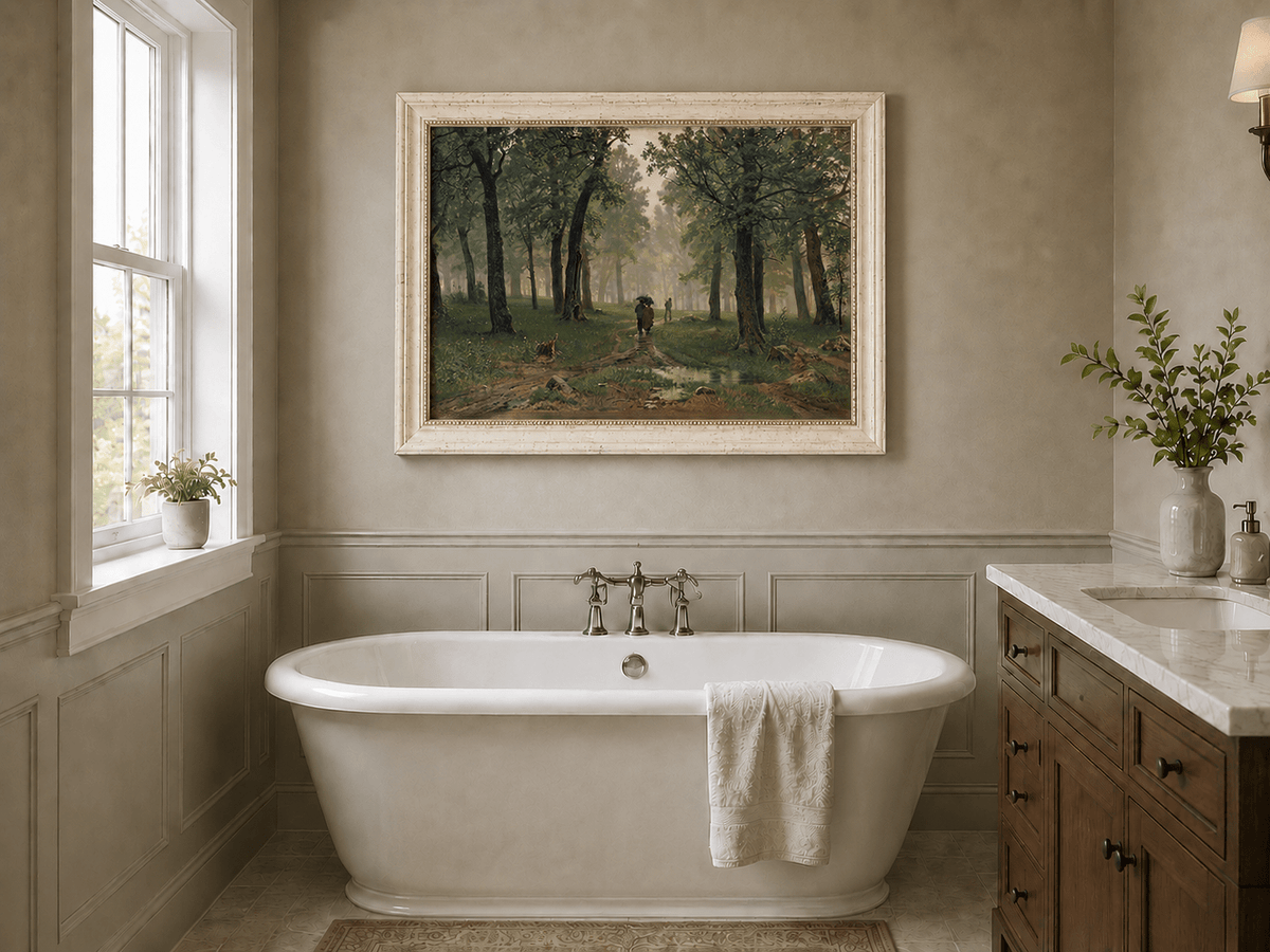 Framed hand-painted misty forest path oil painting with figures among tall trees displayed above a freestanding bathtub.