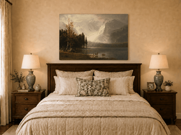 Unframed hand-painted mountain lake oil painting with a deer herd and autumn trees displayed above a wooden bed in a neutral bedroom.