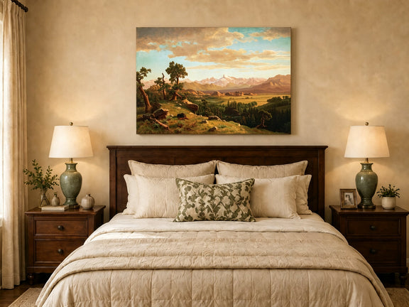 Unframed hand-painted mountain valley panorama with golden hills and distant peaks displayed above a wooden bed in a neutral bedroom.
