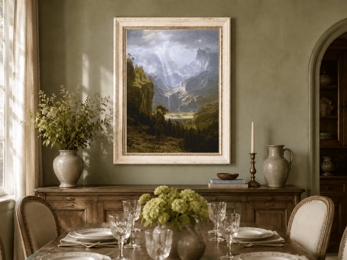 Framed hand-painted mountain valley oil painting with a waterfall and lake displayed above a formal dining table.