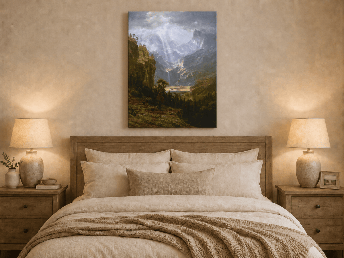 Unframed hand-painted mountain valley oil painting with a waterfall and lake displayed above a wooden bed in a neutral bedroom.