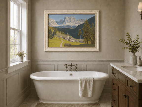 Framed hand-painted alpine landscape oil painting with a mountain village, church and path displayed above a freestanding bathtub.