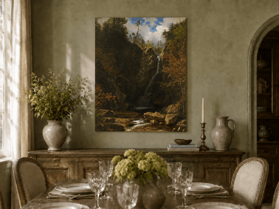Unframed hand-painted mountain waterfall oil painting through a dark autumn forest displayed above a formal dining table.