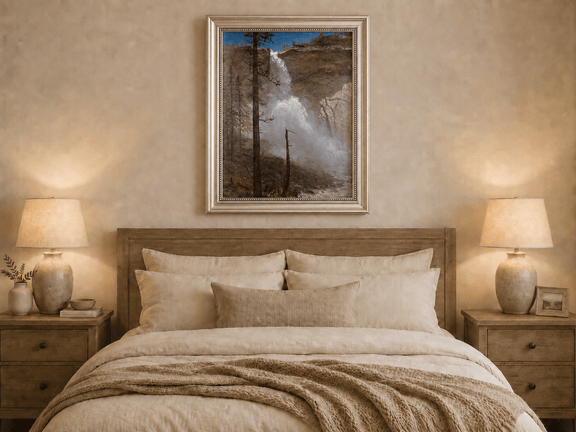 Framed hand-painted mountain waterfall oil painting with rocky cliffs and pine forest displayed above a wooden bed in a neutral bedroom.