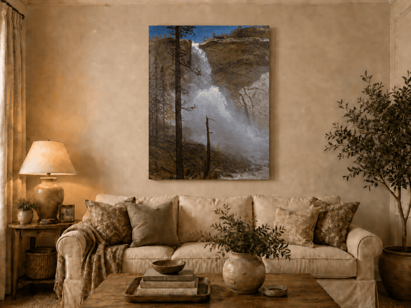 Unframed hand-painted mountain waterfall oil painting with rocky cliffs and pine forest displayed above a neutral living room sofa.