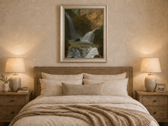 Hand-painted mountain waterfall in a rocky gorge landscape oil painting displayed above a bed in a bedroom interior.