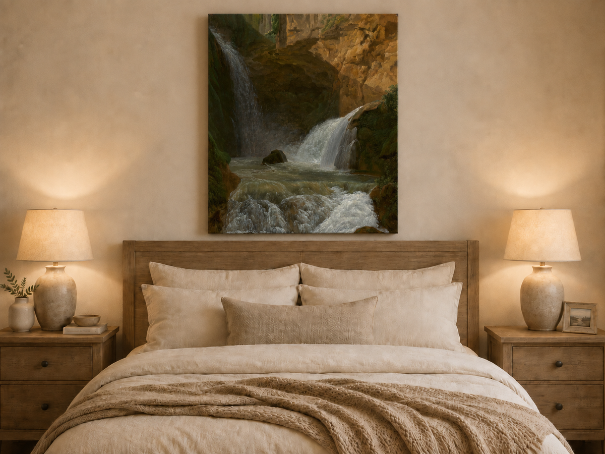 Hand-painted mountain waterfall in a rocky gorge landscape oil painting displayed above a bed in a bedroom interior.