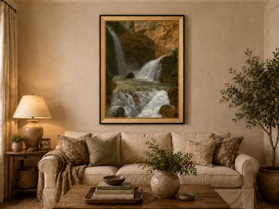 Hand-painted mountain waterfall in a rocky gorge landscape oil painting displayed above a sofa in a living room interior.