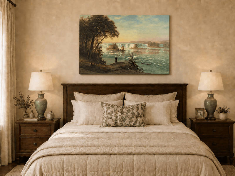 Unframed hand-painted Niagara Falls oil painting with figures near the riverbank displayed above a wooden bed in a neutral bedroom.