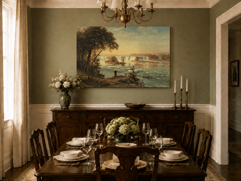 Unframed hand-painted Niagara Falls oil painting with figures near the riverbank displayed above a formal dining table.