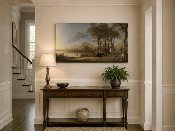 Unframed hand-painted pastoral river valley oil painting with riders and grazing cattle displayed above an entryway console table.