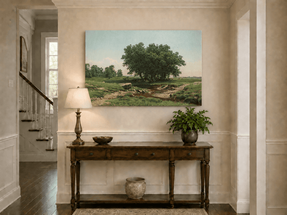 Unframed hand-painted pastoral landscape oil painting with broad trees and a winding stream displayed above an entryway console table.