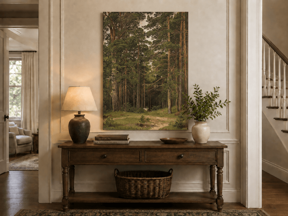 Unframed hand-painted pine forest oil painting with a woodland path and secluded cabin displayed above an entryway console table.
