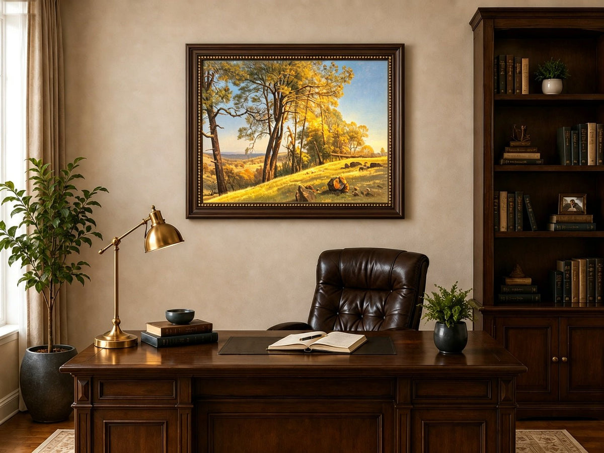 Framed hand-painted pine tree landscape oil painting on a bright sunlit hill displayed above a traditional home office desk.