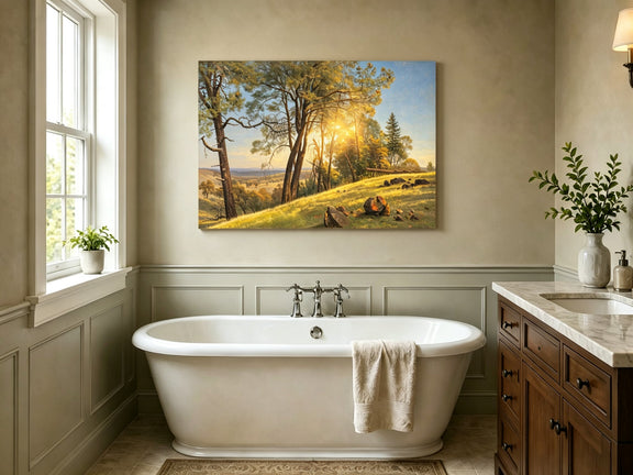 Unframed hand-painted pine tree landscape oil painting on a bright sunlit hill displayed above a freestanding bathtub.