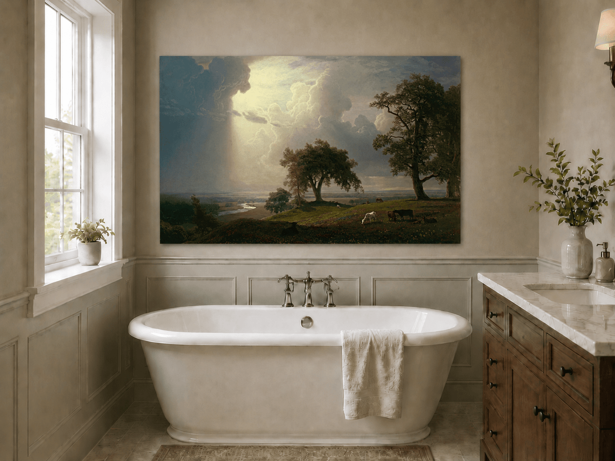 Unframed hand-painted prairie oil painting with cattle beneath dramatic sunbeams displayed above a freestanding bathtub.