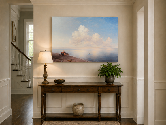 Hand-painted quiet seaside shore with ox cart landscape oil painting displayed above a console table in a hallway interior.