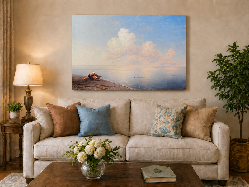 Hand-painted quiet seaside shore with ox cart landscape oil painting displayed above a sofa in a living room interior.