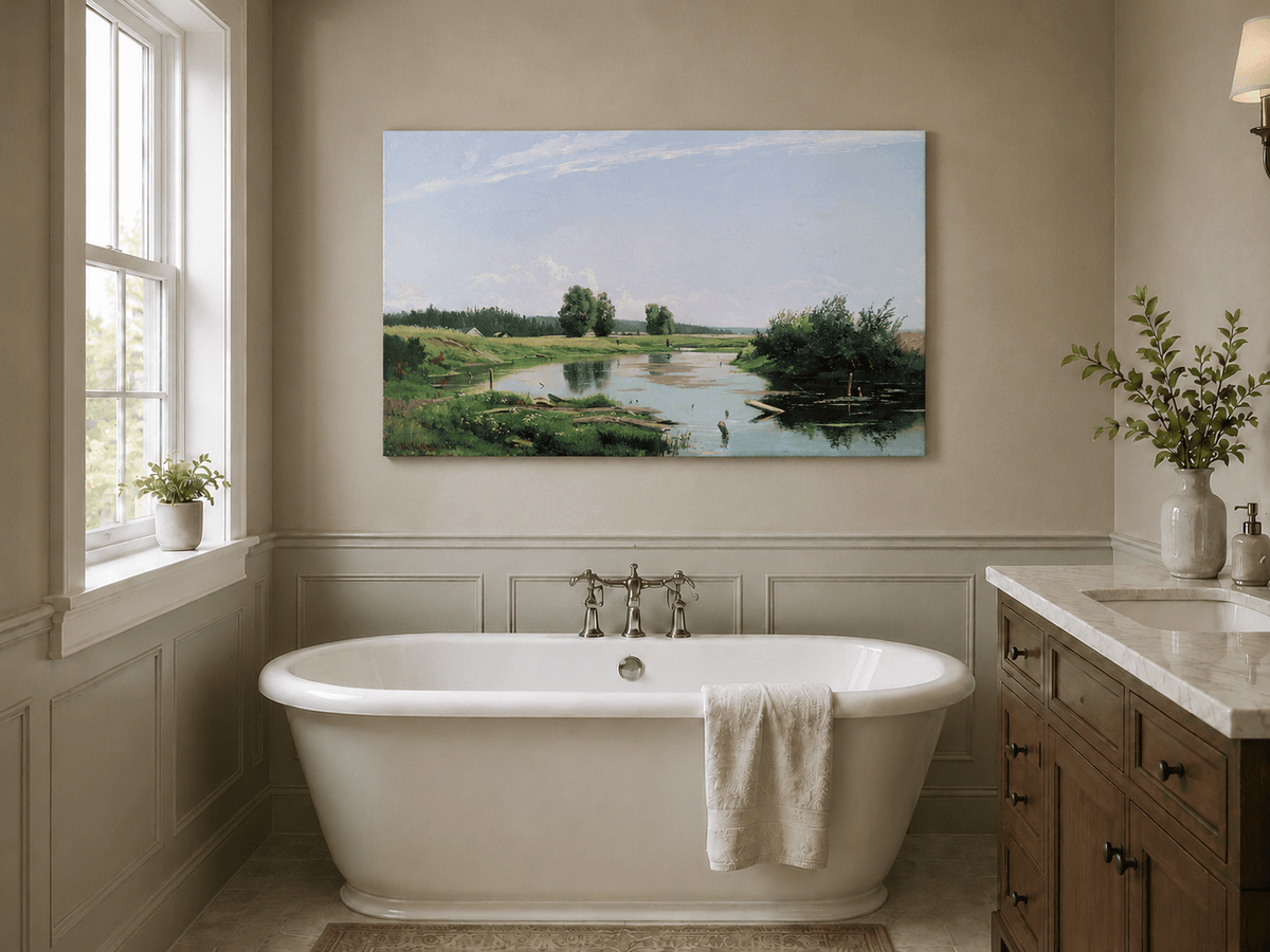 Unframed hand-painted countryside oil painting with a winding river, green fields and trees displayed above a freestanding bathtub.