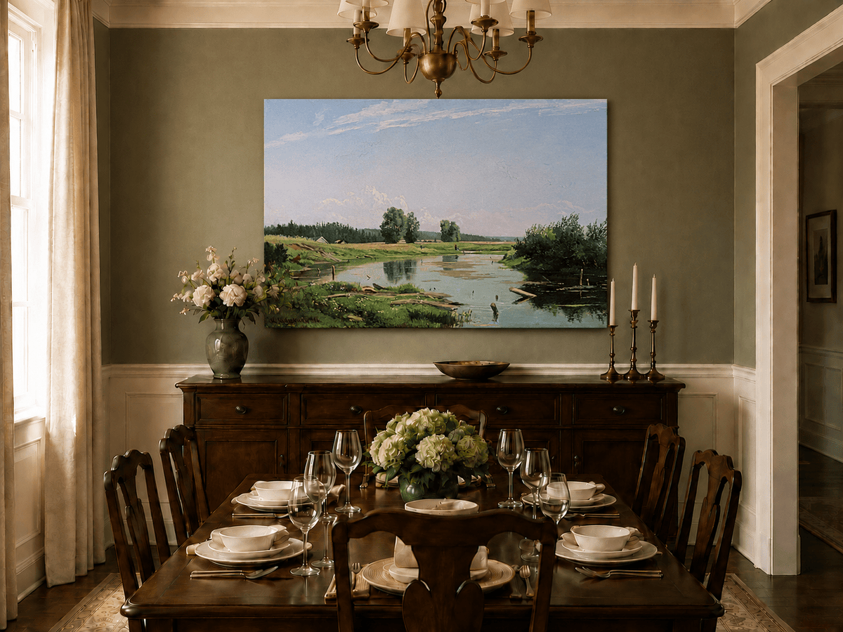 Unframed hand-painted countryside oil painting with a winding river, green fields and trees displayed above a formal dining table.
