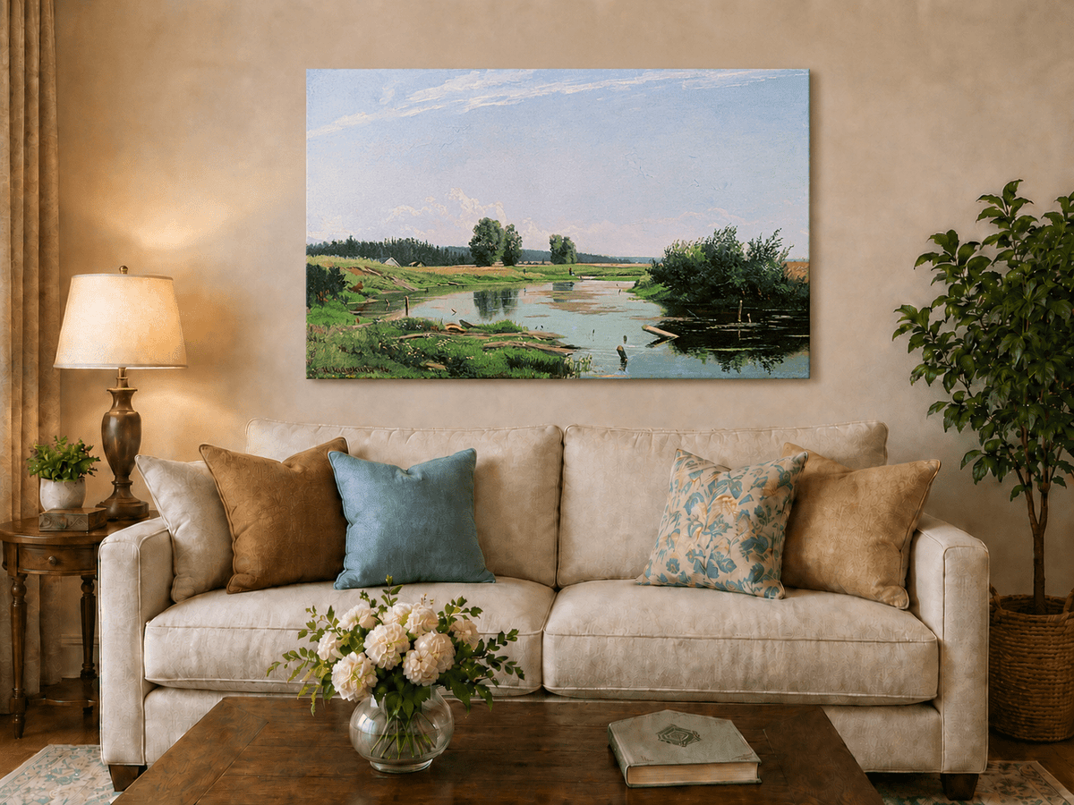 Unframed hand-painted countryside oil painting with a winding river, green fields and trees displayed above a neutral living room sofa.