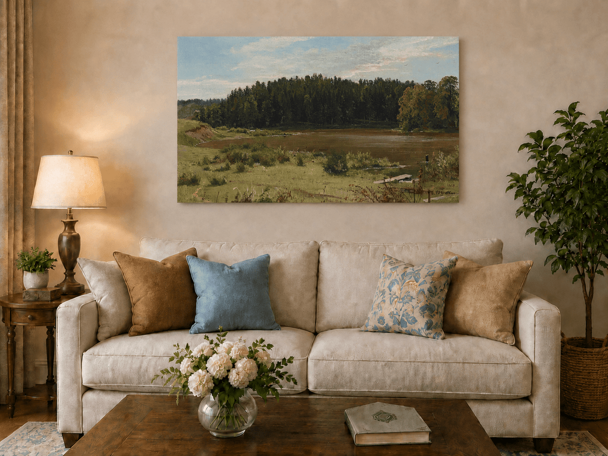 Unframed hand-painted river landscape oil painting with wetlands and a dark forest edge displayed above a neutral living room sofa.