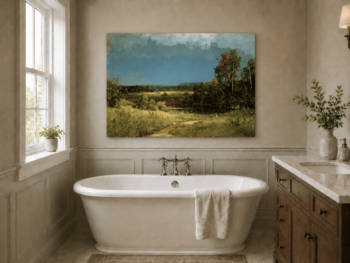 Unframed hand-painted river meadow oil painting beneath a dramatic stormy sky displayed above a freestanding bathtub.