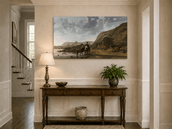 Unframed hand-painted riverside landscape oil painting with figures and animals beneath rocky hills displayed above an entryway console table.