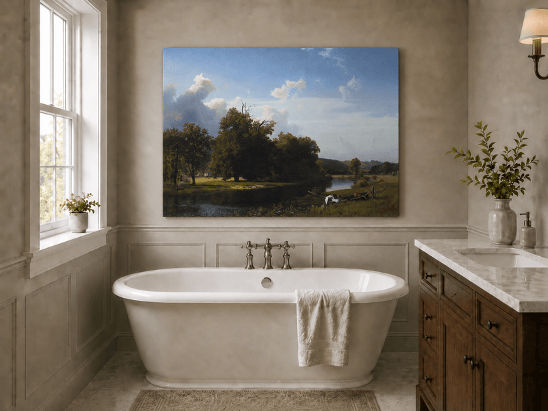 Unframed hand-painted riverside oil painting with a large oak tree, boat and distant cottage displayed above a freestanding bathtub.