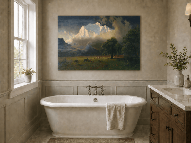 Unframed hand-painted Rocky Mountains oil painting of Lander's Peak above a dramatic valley displayed above a freestanding bathtub.