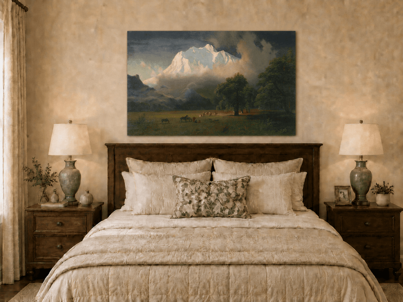 Unframed hand-painted Rocky Mountains oil painting of Lander's Peak above a dramatic valley displayed above a wooden bed in a neutral bedroom.