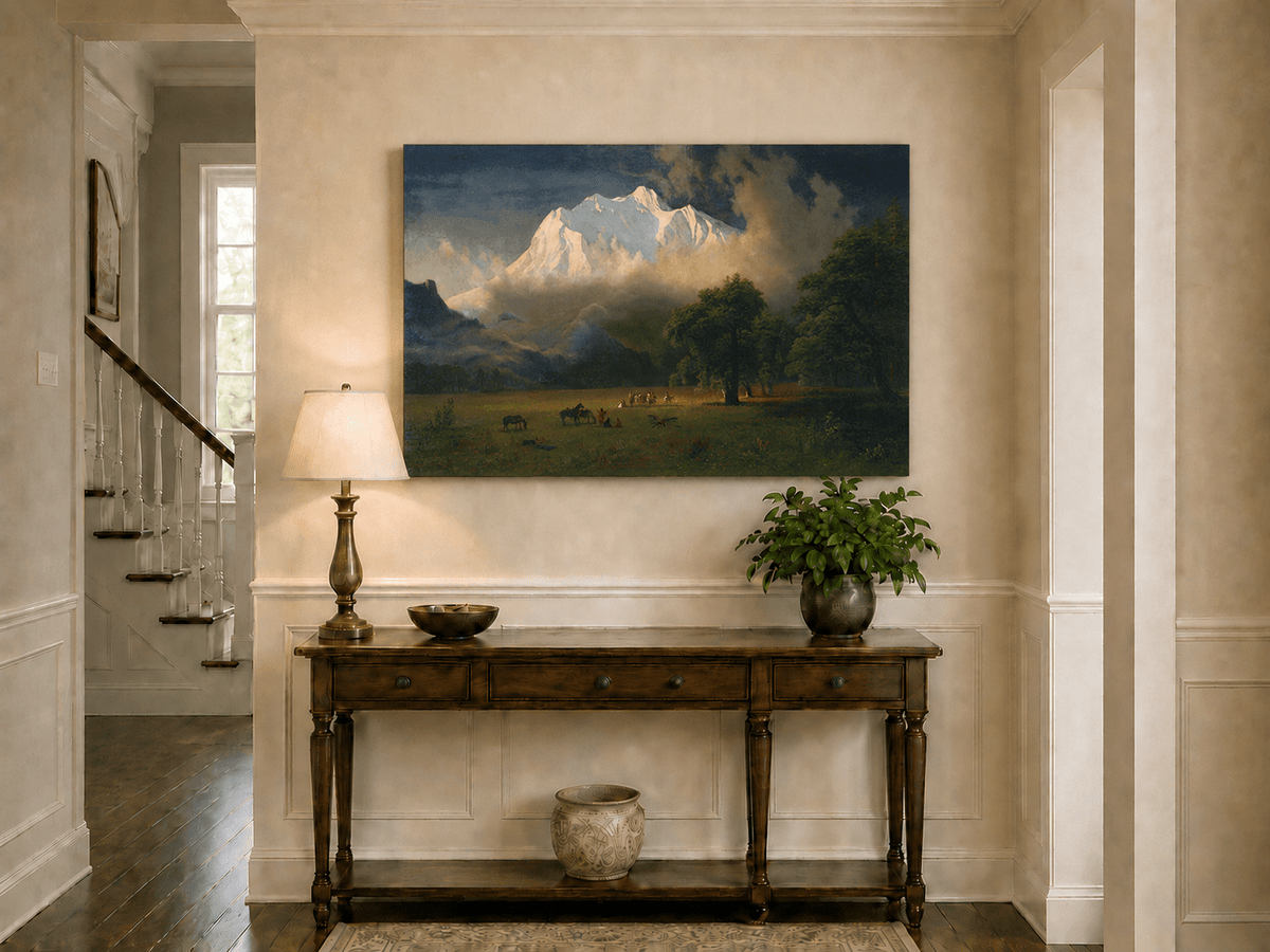 Unframed hand-painted Rocky Mountains oil painting of Lander's Peak above a dramatic valley displayed above an entryway console table.