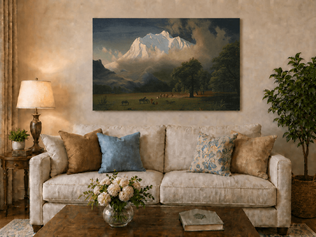 Unframed hand-painted Rocky Mountains oil painting of Lander's Peak above a dramatic valley displayed above a neutral living room sofa.