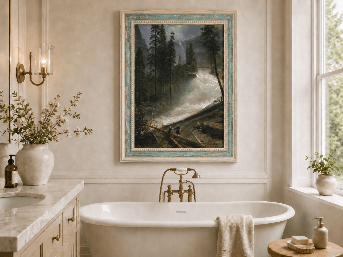 Framed hand-painted forest oil painting with figures beside a rushing river and waterfall displayed above a freestanding bathtub.